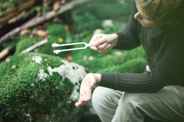 Sound Healing Therapist  Meditation With Tuning Fork in Nature Outdoors
