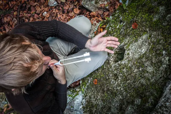 Sound Healing Therapist  Season With Tuning Fork in Nature Outdoors