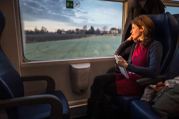 Serene Woman Travel With Train in Morning Tranquility and Beautiful Light