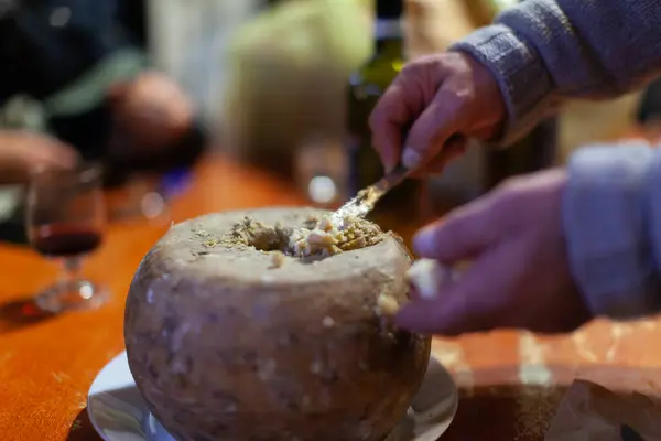 Famous Casu Marzu or Casu Martzu Cheese with Worms from Sardinia Italy. This pecorino is closer to a stage of decomposition rather than fermentation. It is famous as the most dangerous cheese in the World as written in the Guinness Book of Records.