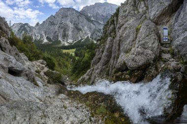 Spring of River Nadiza and famous hiking destination Slemenova peak in Julian Alps - Triglav national park -  Slovenia clipart