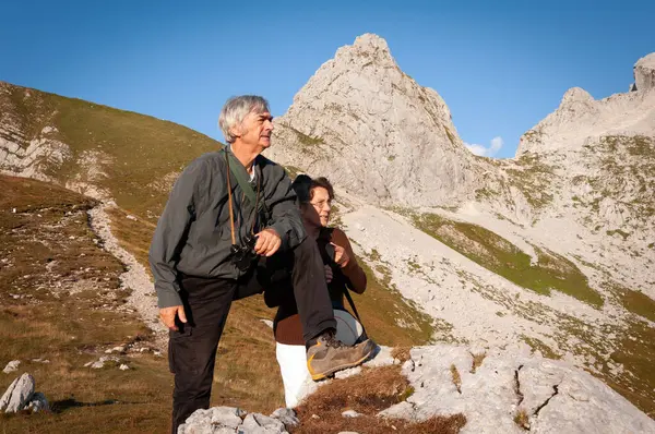 Retirement Plan - Visiting all Travel Destinations and All Mountains Around - Senior Couple Journey in High Mountains
