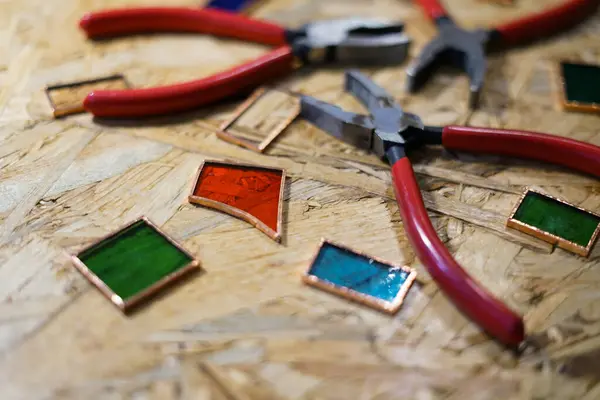 stock image Pieces of colorful glass. Stained glass workshop. 