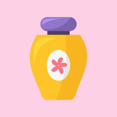 Üzerinde çiçek olan bir şişe parfüm.