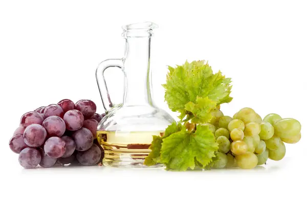Fresh Grapes in Basket with Grape Seed Oil - Pure Elegance for Your Health | Premium Grape Products on White Background