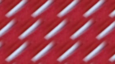 Kırmızı ve beyaz çizgilerin soyut deseni dinamik ve görsel olarak ilginç bir kompozisyon oluşturuyor. Kalın renkler ve köşegen çizgiler hareket ve enerji hissi yaratır.