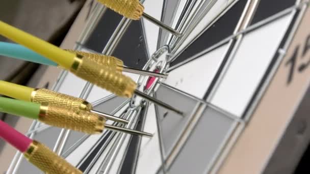 Closeup Shot Multiple Darts Dartboard While Another One Hits Fun — Stockvideo