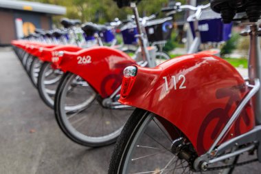 Bikes for rental in Maribor city, Slovenia. They are all over the city used for travelling acros the city clipart