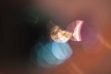 Soyut arkaplan. Bokeh topları ile odak ışığı kapalı. 