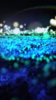 Parlak enerjinin sihirli dalgaları. Yüksek teknoloji gökkuşağı ışık parçacıkları ve bokeh enerjisi.