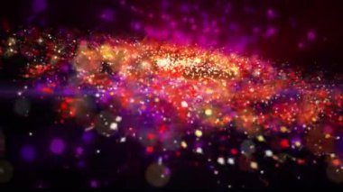 Üç boyutlu galaksi hızla döner, ışık yayar ve parlak göktaşları saçar..