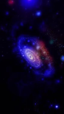 Parlak spiral şekilli üç boyutlu bir galaksi hızla pozisyon değiştiriyor. Önümüzde güzel ve beklenmedik açılarda beliriyor..