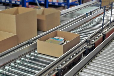 logistic warehouse. packing line in a logistics warehouse. conve