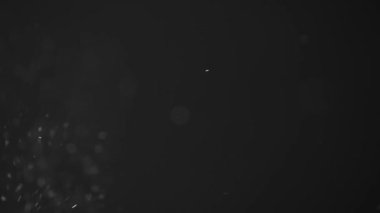 Kara Arkaplanda Yüzen Soyut Parçacıklar Rüya Atmosfer Oluşturuyor