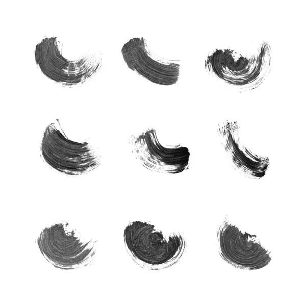 抽象ベクトルブラックペイントスミアセット 手描きのデザイン要素 白の背景に黒インクのマーク 粒状の食感 — ストックベクタ