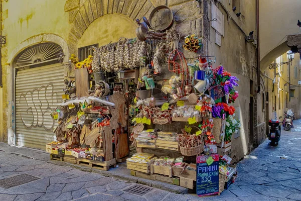 Pavement shop in Florence Italy with all products on show