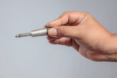 Yatay görünümlü metal kriko ile el ele tutuşma çeyrek inç ses dolgusu