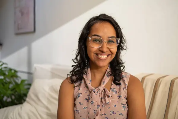 stock image Closeup of happy Hispanic woman with a glasses in the apartment with lot of sunlight looking at the camera with a big smile. High quality photo