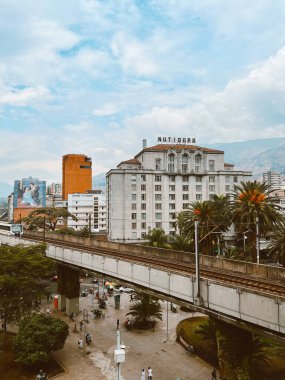 Medellin, Antioquia, Colombia. April 2, 2024: View of the Nutibara hotel and the Medellin metro from the Palace of Culture. clipart