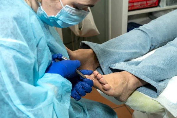 Podiatrist Uses Pair Pliers Cut Clients Toenail Concept Hygiene Good — Stock Photo, Image