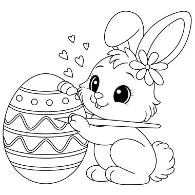 Mutlu küçük tavşan sehpa boyama sayfasına Paskalya yumurtası çiziyor.