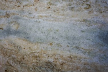 Mavi bej krem rengi mermer benekli doku arkaplanının yakın görüntüsü 