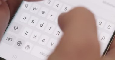 Man typing a text message on his smartphone. Hand of man typing or chat. High quality 4k footage