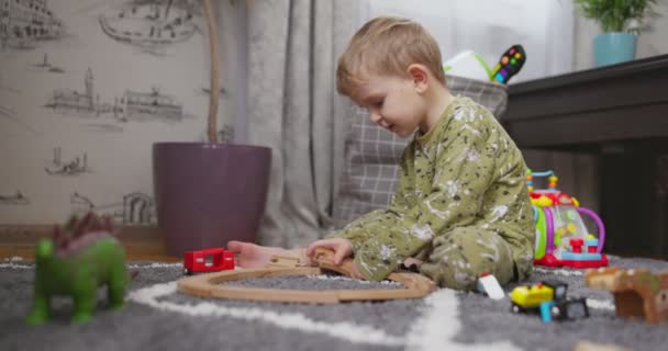 Child Playing Developmental Toys Baby Playing Toy Railroad Trains Cars — Wideo stockowe