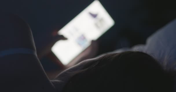 Woman Lies Bed Night Uses Smartphone Female Using Mobile Phone — kuvapankkivideo
