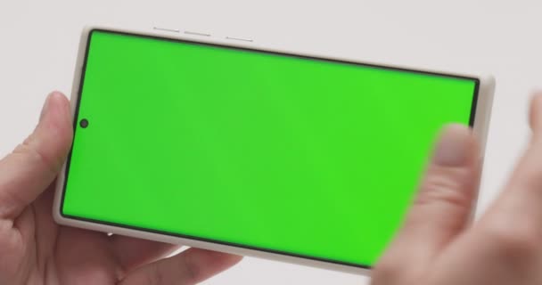 Close Woman Hands Holding Smartphone Green Screen Horizontal Position Using — Stockvideo