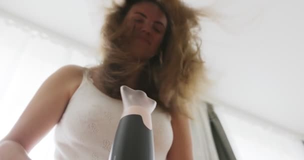 Beautiful Young Woman Using Hair Dryer Window Home High Quality — Stockvideo