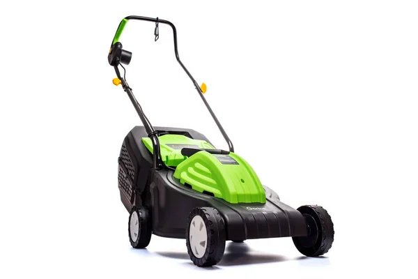 Garden electric lawn mower with a grass collector isolated on white background. Lawn mower