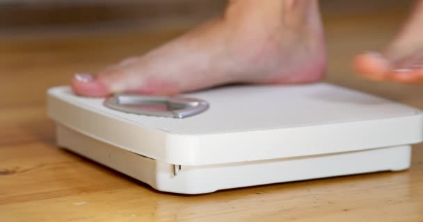 Woman Stands White Scale Floor Measures Her Weight High Quality — Stock Video