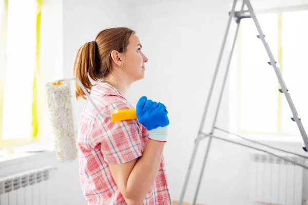 People Renovation Home Improvement Positive Satisfied Woman Holding Dirty Roller — Stock Photo, Image