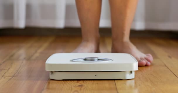 Woman Stands White Scale Floor Measures Her Weight High Quality — Stock Video