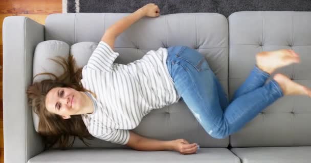 Happy Positive Woman Stretched Out Cozy Sofa While Relaxing Her — Stock Video