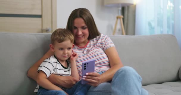 Woman Her Little Son Sitting Cozy Sofa Smartphone Family Spend — Stock Video