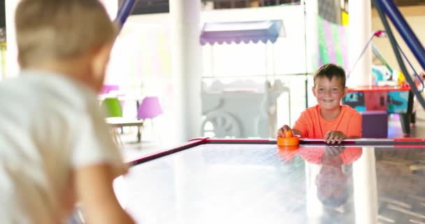 Kids Play Air Hockey Have Fun Amusement Center Children Having — Stock Video