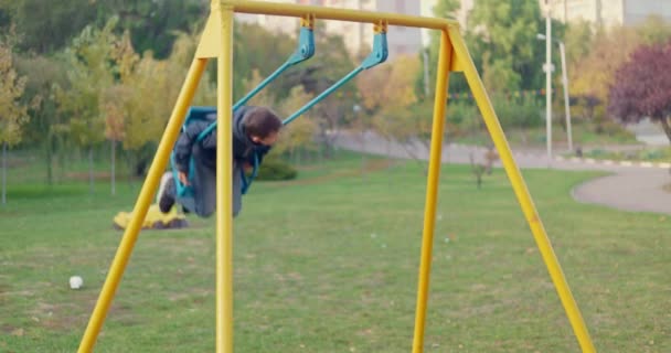 Boy Swinging Swing Park Child Having Fun Playing Outdoor Public — Stock Video