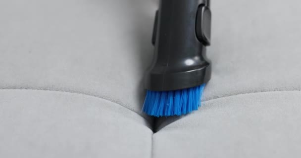 Close Vacuum Brush Tool Cleaning Grey Upholstered Surface High Quality — Stock Video