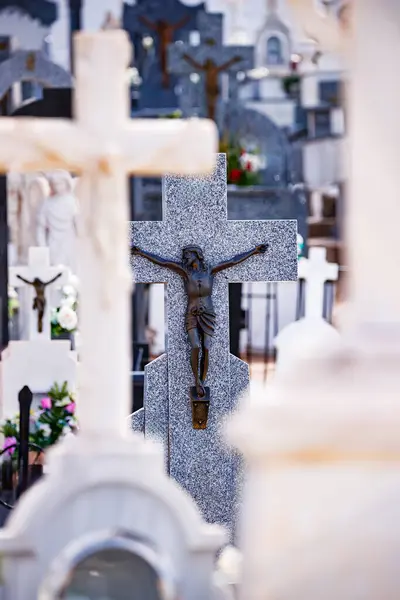 Statues of the crucified Christ in the cemetery of Alhambra