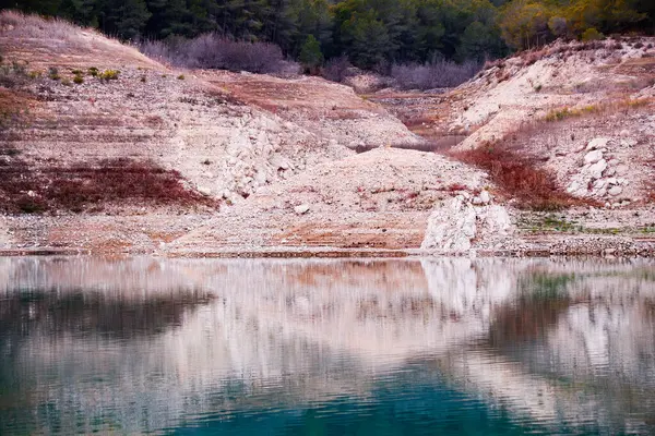 Reflection of the hills in the Villajoyosa reservoir