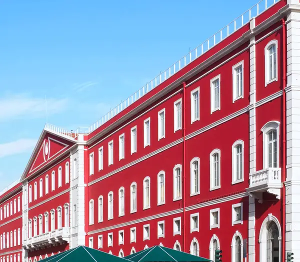 stock image Epic red facade of the railway sation Santa Apolonia in Lisbon Portugal