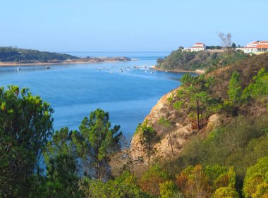 Beautiful Vila Nova de Milfontes at the Alentejo coastline of Portugal clipart