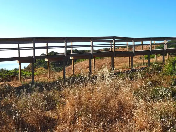 stock image hiking from beach praia de dona ana in Lagos, Portuhgal, to ponta de Piedade on new wooden broadwalks