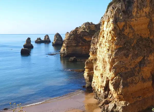 stock image hiking from beach praia de dona ana in Lagos, Portuhgal, to ponta de Piedade on new wooden broadwalks