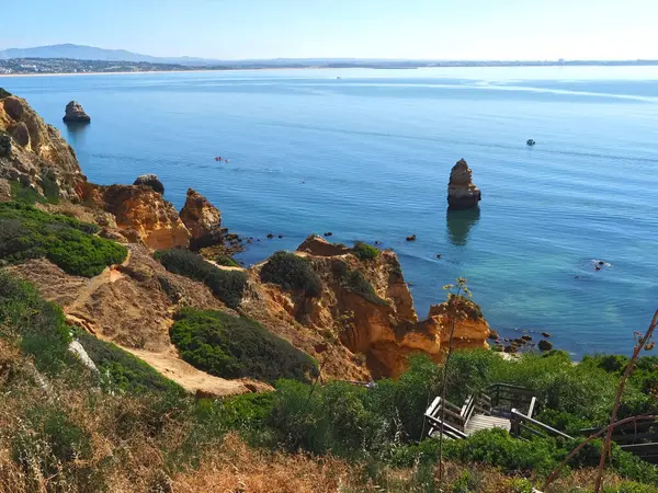 stock image hiking from beach praia de dona ana in Lagos, Portuhgal, to ponta de Piedade on new wooden broadwalks