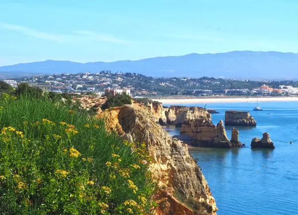 Stock image hiking from beach praia de dona ana in Lagos, Portuhgal, to ponta de Piedade on new wooden broadwalks