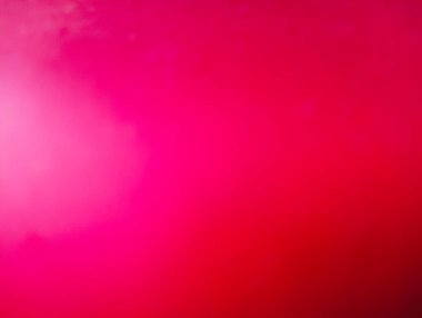 Renkler arasında pürüzsüz ve yumuşak bir geçiş yaratan, kırmızı ve pembe renklerin gradyanı olan soyut bir görüntü. Görüntünün bulanık ve rüya gibi bir etkisi var, canlı tonları vurguluyor..