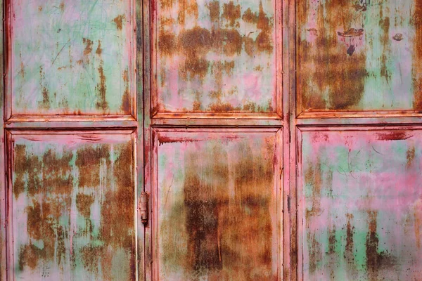 rusty background of an old shop door